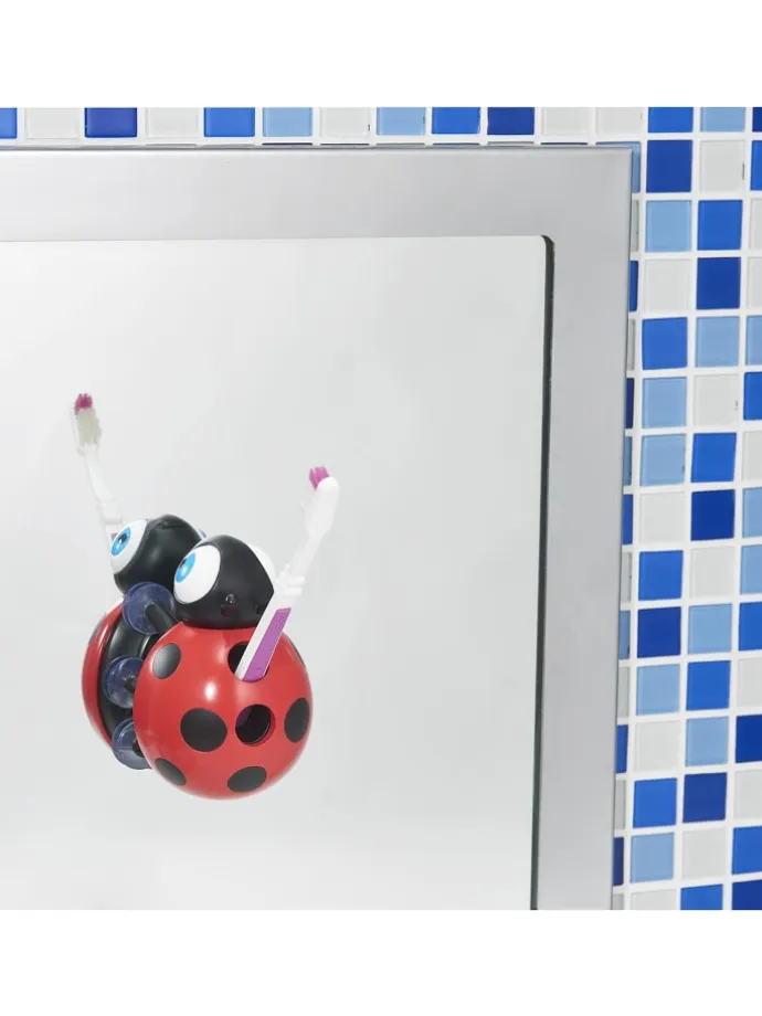 Cocomelon - singender Zahnbürstenhalter Marienkäfer in mehrfarbig