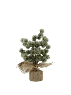 Künstllicher Zedernbaum mit Schnee in grün