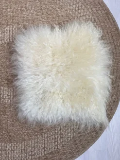 Lammfell-Sitzauflage in Weiß